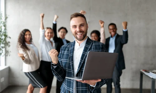 joyful-businessman-and-his-team-celebrating-busine-2026-01-08-23-25-31-utc